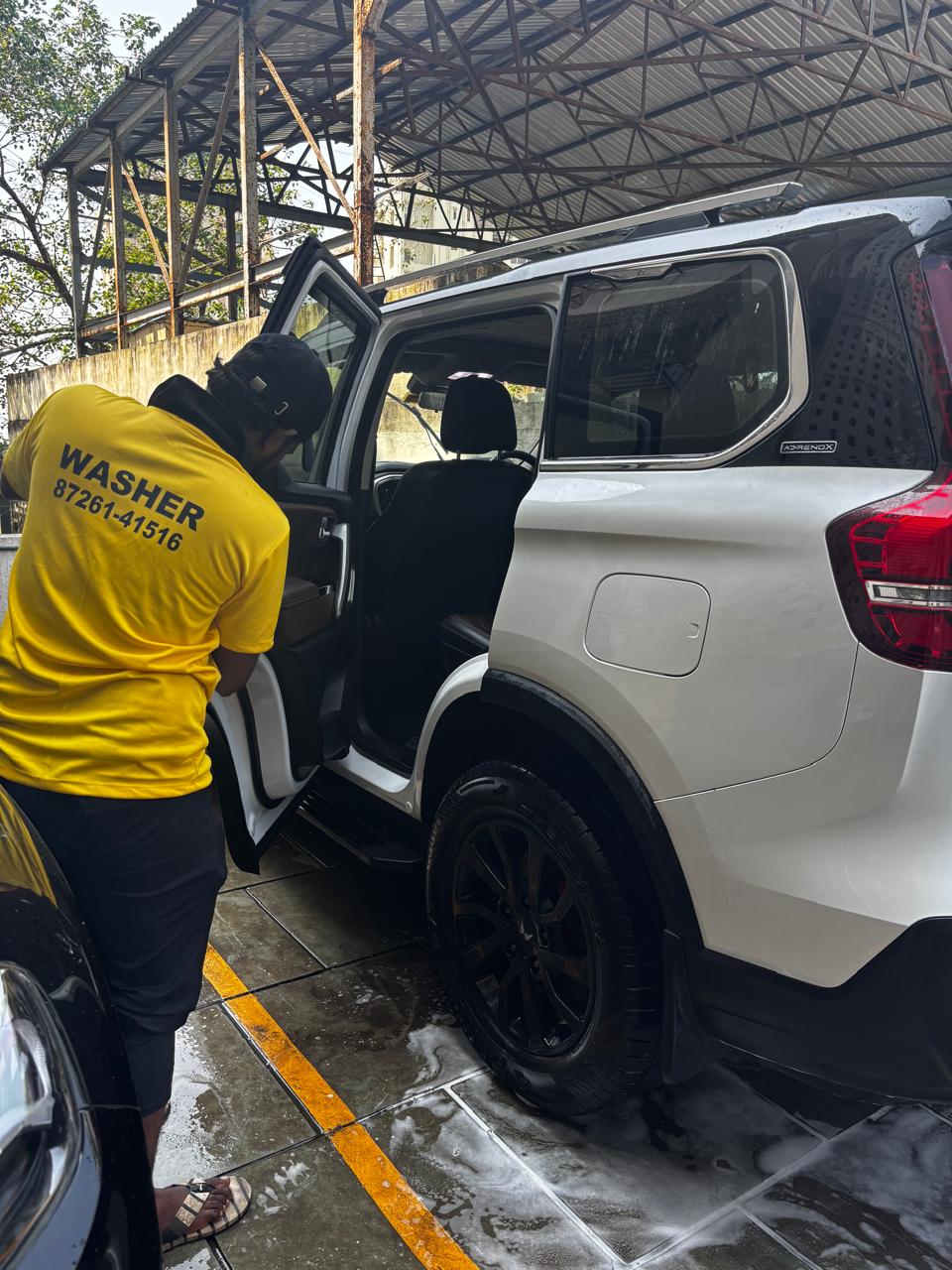Professional doorstep car wash in Mumbai using pressure wash and steam machine